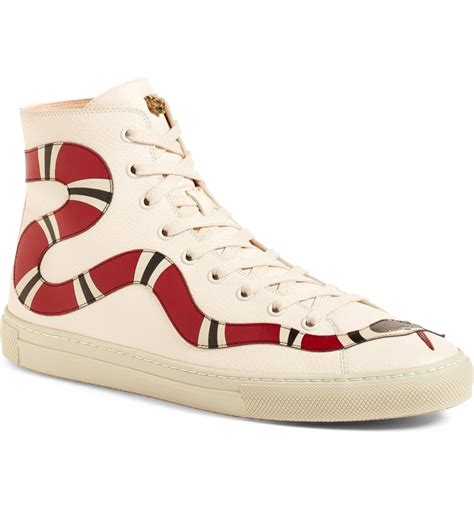 gucci snake sneakers.